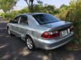 Mazda 626   2004 - Cần bán gấp Mazda 626 sản xuất năm 2004, màu bạc số sàn