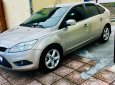 Ford Focus   2011 - Bán xe Ford Focus Hatchback sản xuất năm 2011, màu vàng