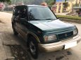 Suzuki Vitara G 2005 - Gia đình cần bán Vitara 2005, số sàn, màu xanh, hai cầu