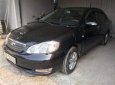 Toyota Corolla 2003 - Bán Toyota Corolla sản xuất năm 2003, màu đen xe gia đình, giá 186tr