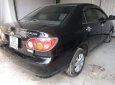 Toyota Corolla 2003 - Bán Toyota Corolla sản xuất năm 2003, màu đen xe gia đình, giá 186tr