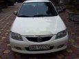 Mazda 323 2002 - Chính chủ bán ô tô Mazda 323 sản xuất năm 2002, màu trắng