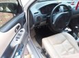 Mazda 323 2002 - Chính chủ bán ô tô Mazda 323 sản xuất năm 2002, màu trắng