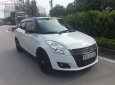 Suzuki Swift 1.4AT 2014 - Cần bán xe Suzuki Swift 1.4AT đời 2014, màu trắng số tự động