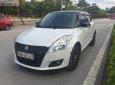 Suzuki Swift 1.4AT 2014 - Cần bán xe Suzuki Swift 1.4AT đời 2014, màu trắng số tự động