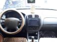 Ford Laser  1.6MT 2001 - Cần bán gấp Ford Laser 1.6MT năm 2001, màu trắng