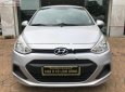 Hyundai i10 1.0MT Base 2014 - Cần bán gấp Hyundai i10 1.0MT Base 2014, màu bạc chính chủ