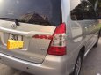 Toyota Innova 2.0E 2015 - Cần bán gấp Toyota Innova 2.0E 2015, màu bạc xe gia đình, giá chỉ 589 triệu