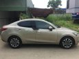 Mazda 2 2016 - Cần bán lại xe Mazda 2 2016, màu vàng số tự động