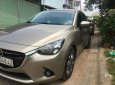 Mazda 2 2016 - Cần bán lại xe Mazda 2 2016, màu vàng số tự động