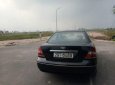 Ford Mondeo 2003 - Bán ô tô Ford Mondeo 2003, màu đen xe gia đình