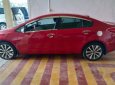 Kia K3 2015 - Cần bán gấp Kia K3 sản xuất năm 2015, màu đỏ xe gia đình