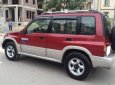 Suzuki Vitara 2005 - Gia đình cần bán Vitara 2005, số sàn, hai cầu, màu đỏ