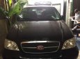 Kia Carnival  MT 2006 - Bán Kia Carnival MT sản xuất năm 2006, màu đen, xe đẹp