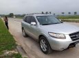 Hyundai Santa Fe MLX 2007 - Bán ô tô Hyundai Santa Fe MLX năm 2007, màu bạc xe gia đình