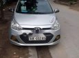 Hyundai Grand i10  MT 2015 - Bán Hyundai Grand i10 MT sản xuất năm 2015, màu bạc, vẫn mới