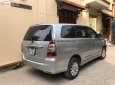 Toyota Innova 2.0E 2014 - Bán Toyota Innova 2.0E đời 2014, màu bạc, tư nhân mua từ mới