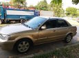 Ford Laser GHIA 1.8 MT 2002 - Cần bán lại xe cũ Ford Laser GHIA 1.8 MT năm 2002