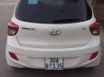 Hyundai Grand i10  1.2MT 2015 - Bán ô tô Hyundai Grand i10 1.2MT năm 2015, màu trắng, xe chính chủ đi giữ gìn
