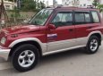 Suzuki Vitara 2005 - Gia đình cần bán Vitara 2005, số sàn, hai cầu, màu đỏ