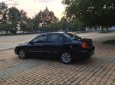 Kia Spectra 1.6 MT 2004 - Bán Kia Spectra 1.6 MT đời 2004, màu đen chính chủ 