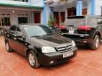 Daewoo Lacetti 2009 - Bán Daewoo Lacetti năm 2009, màu đen, xe còn rất đẹp, máy êm, gầm bệ chắc chắn