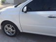 Chevrolet Aveo 2014 - Gia đình cần bán Aveo 2014, số sàn, màu trắng tinh