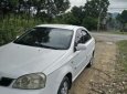 Daewoo Lacetti SE   2004 - Bán ô tô Daewoo Lacetti SE đời 2004, màu trắng, 5 mâm đúc