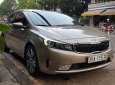 Kia Cerato 1.6MT 2018 - Bán xe Kia Cerato 1.6 MT SX 2018, màu vàng cát