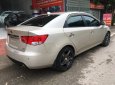 Kia Forte 1.6MT 2010 - Cần bán Kia Forte 1.6MT đời 2010, màu kem (be), giá tốt