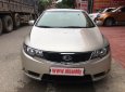 Kia Forte 1.6MT 2010 - Cần bán Kia Forte 1.6MT đời 2010, màu kem (be), giá tốt