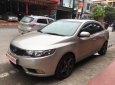 Kia Forte 1.6MT 2010 - Cần bán Kia Forte 1.6MT đời 2010, màu kem (be), giá tốt