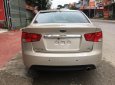 Kia Forte 1.6MT 2010 - Cần bán Kia Forte 1.6MT đời 2010, màu kem (be), giá tốt