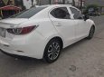 Mazda 2   2016 - Bán ô tô Mazda 2 2016, màu trắng số tự động