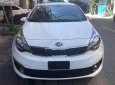 Kia Rio 1.4MT 2015 - Cần bán gấp Kia Rio 1.4MT 2015, màu trắng, xe nhập

