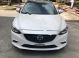 Mazda 6 2.0 2015 - Cần bán lại xe Mazda 6 2.0 đời 2015, màu trắng còn mới, 715tr