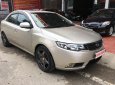 Kia Forte 1.6MT 2010 - Cần bán Kia Forte 1.6MT đời 2010, màu kem (be), giá tốt