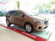 Kia Sedona Platinum G 2018 - Bán xe Kia Sedona Platinum G 2018, màu vàng