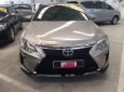 Toyota Camry   2.0E  2016 - Bán ô tô Toyota Camry 2.0E 2016, màu vàng, xe nhập