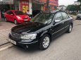 Ford Laser GHIA 1.8 AT 2003 - Cần bán Ford Laser GHIA 1.8 AT đời 2003, màu đen số tự động