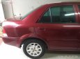 Ford Laser 1.6 2002 - Gia đình bán Ford Laser 1.6 đời 2002, màu đỏ  