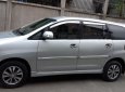 Toyota Innova E 2015 - Cần bán Toyota Innova E 2015 số sàn, màu bạc