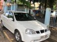 Daewoo Lacetti 2004 - Cần bán gấp Daewoo Lacetti năm sản xuất 2004, màu trắng chính chủ