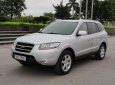 Hyundai Santa Fe  2.0AT 2WD MLX  2009 - Cần bán lại xe Hyundai Santa Fe đăng ký 2009, màu bạc nhập khẩu nguyên chiếc bản MLX, giá tốt 570 triệu