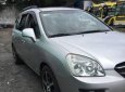 Kia Carens 2010 - Gia đình bán Kia Carens SX 2010, màu bạc số tự động