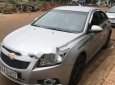 Chevrolet Cruze 2011 - Bán xe Chevrolet Cruze đời 2011, màu bạc xe gia đình, giá 310tr