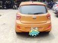 Hyundai Grand i10 1.2 AT 2016 - Cần bán xe Hyundai Grand i10 1.2 AT sản xuất năm 2016, màu cam, nhập khẩu nguyên chiếc, giá tốt