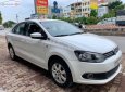 Volkswagen Polo 1.6 2014 - Cần bán xe Volkswagen Polo 1.6 sản xuất năm 2014, màu trắng, nhập khẩu 