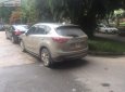 Mazda CX 5 2014 - Cần bán gấp Mazda CX 5 năm 2014, màu vàng như mới 