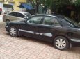 Mazda 626   2005 - Cần bán Mazda 626 đời 2005, màu đen, xe gia đình, giá chỉ 175 triệu